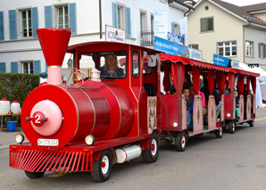 Ride on the Bimmelbahn to dinner with a view of Zurich