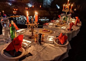 Se régaler avec une raclette dans la grotte du Hölloch